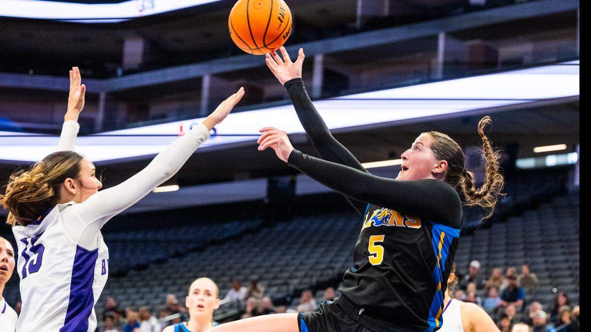 Faith Christian Lions guard Lauren Harris shoots against the Bret Harte Bullfrogs in the CIF Sac-Joaquin Section Division V girls basketball championship at Golden 1 Center on Saturday, Feb. 28.