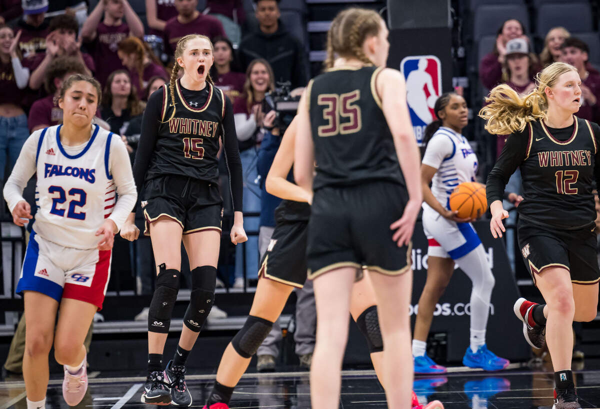 Whitney Wildcats forward Harper Peterson (15) celebrates a foul called in her team’s favor against the Christian Brothers Falcons in the CIF Sac-Joaquin Section Division II high school girls basketball championship game in February.