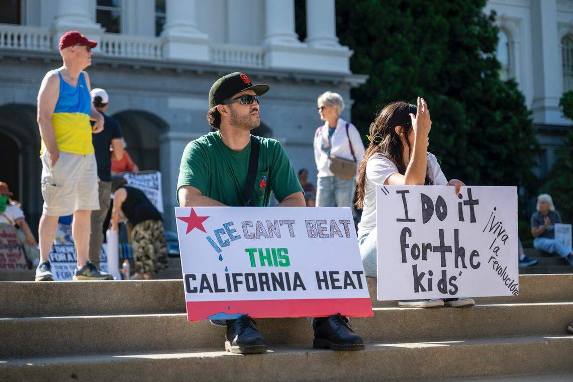 Alejandro Heredia sits on the steps of the state Capitol before the “No Kings” protest against President Donald Trump in Sacramento on Saturday.