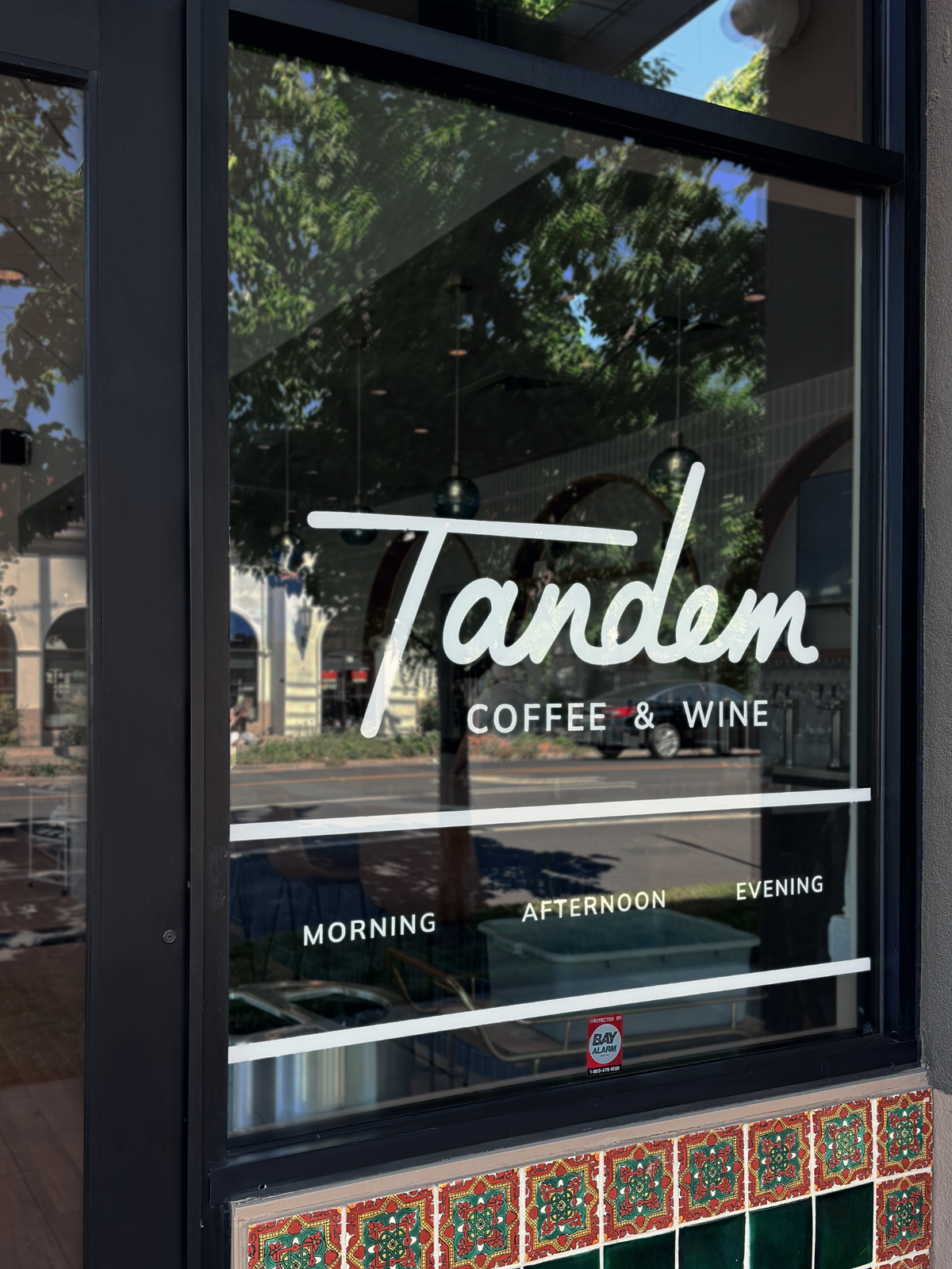 Worl’s friend, Hanna Romley, designed the Tandem logo, seen on an exterior window facing Alhambra Boulevard.
