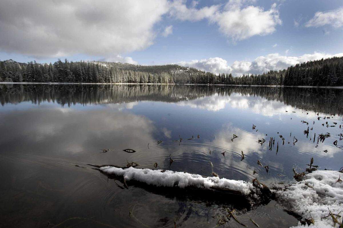 Snow blankets the ground around Serene Lakes near Donner Summit in 2009. A San Francisco man has recovered after he was bitten by two river otters while swimming in the lake that’s about 38 miles northwest of Lake Tahoe in Placer County.