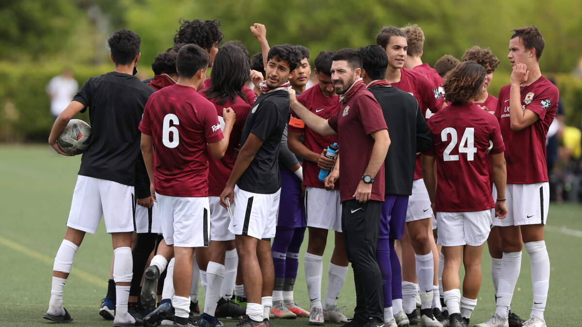 Sacramento Republic youth academy players huddle during a national MLS Next tournament in Dallas in July, 2022.