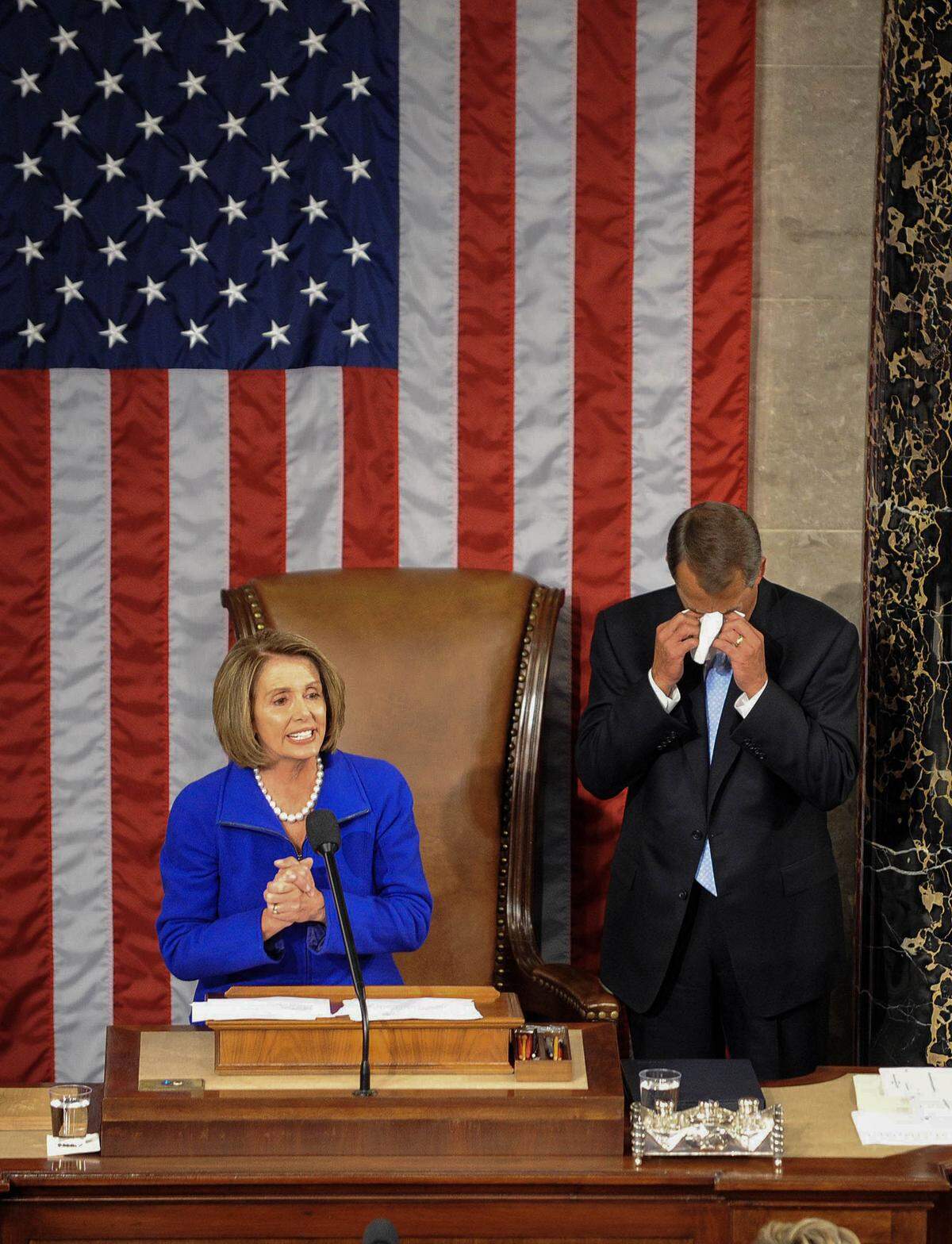 Incoming Speaker of the House John Boehner, R-Ohio, wipes his tears as he is introduced by outgoing Speaker Nancy Pelosi, D-Calif., during the opening session of the 112th Congress on Jan. 5, 2011 on Capitol Hill in Washington, D.C.