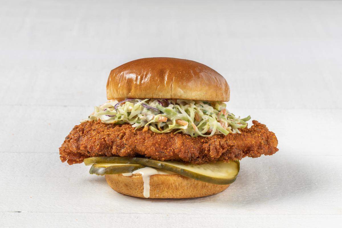 Bruxie’s roughly $14 Honey Hot Chicken Sandwich comes with sweet and spicy fried chicken, pickles, housemade slaw and honey mustard.