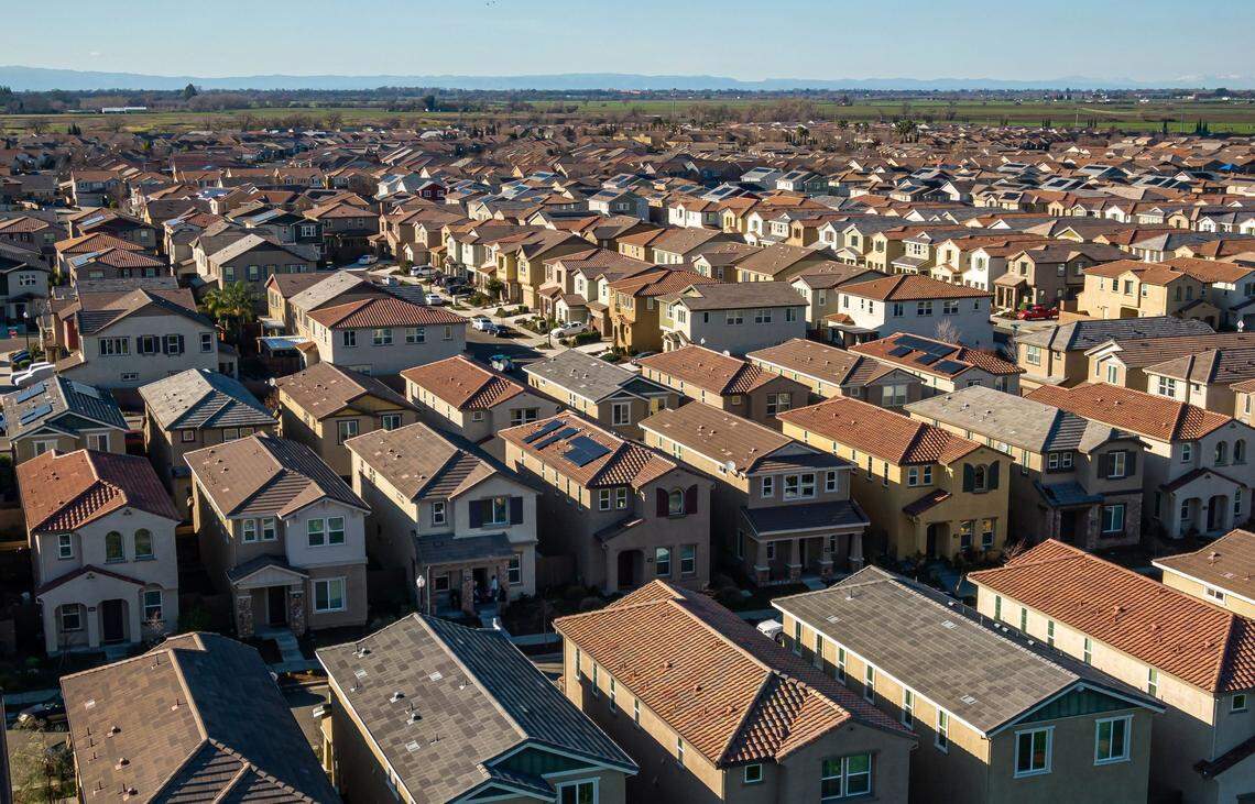 A drone photos shows homes nestled together in North Natomas’ Westshore neighborhood in January.