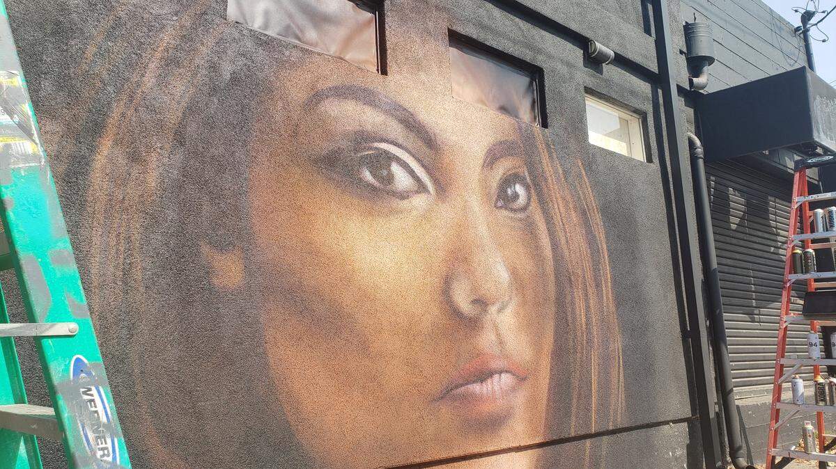 A mural along Arden Way near Del Paso Boulevard depicts Michelle Benavidez, who was found dead in Meadowview in May.