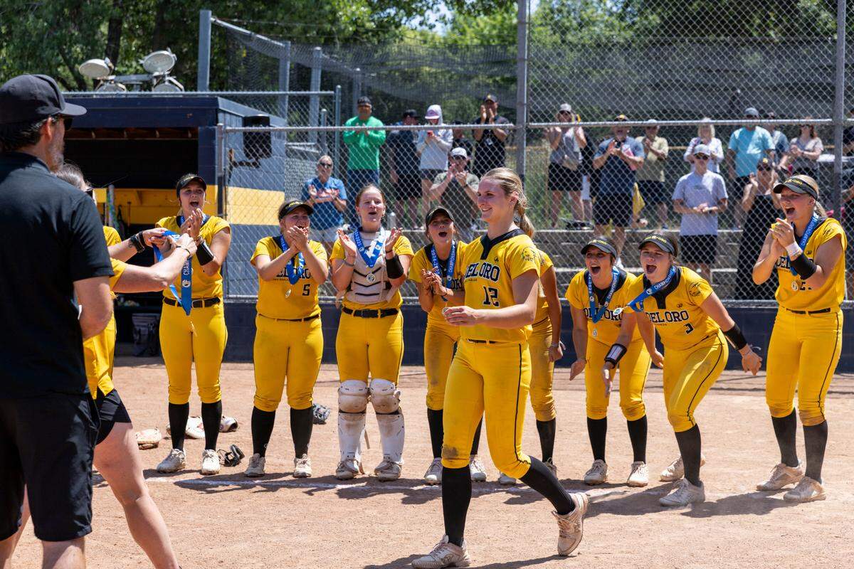 The Del Oro Golden Eagles cheer for pitcher Mikayla Finn, center, as she receives her medal after winning the CIF Northern California Division I softball championship against the Oak Ridge Trojans on Saturday, June 7, 2025, at Oak Ridge High School.