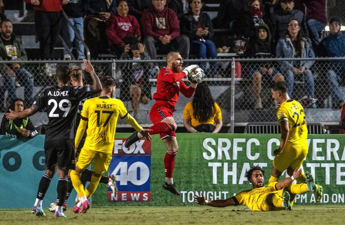 Sacramento Republic FC goalkeeper Danny Vitelli, (31,) saves the ball against New Mexico United during the USL Championship playoff game Saturday at Heart Health Park. Vitelli held off the New Mexico’s offense for a 1-0 victory.