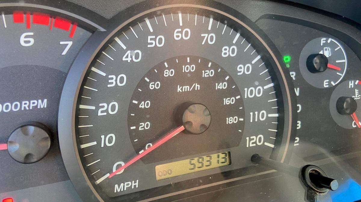 A tampered odometer is pictured.