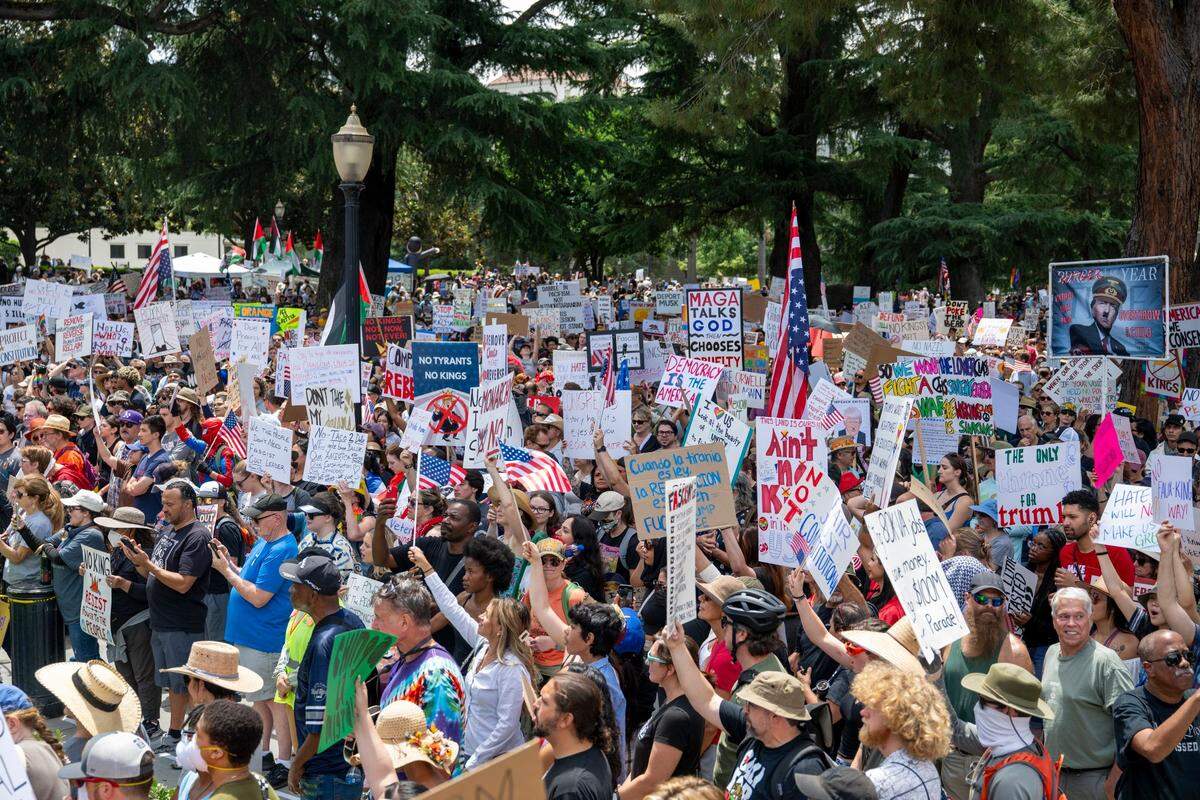 Demonstrators protest at the state Capitol during the “No Kings” protest against the Trump administration in downtown Sacramento on Saturday.