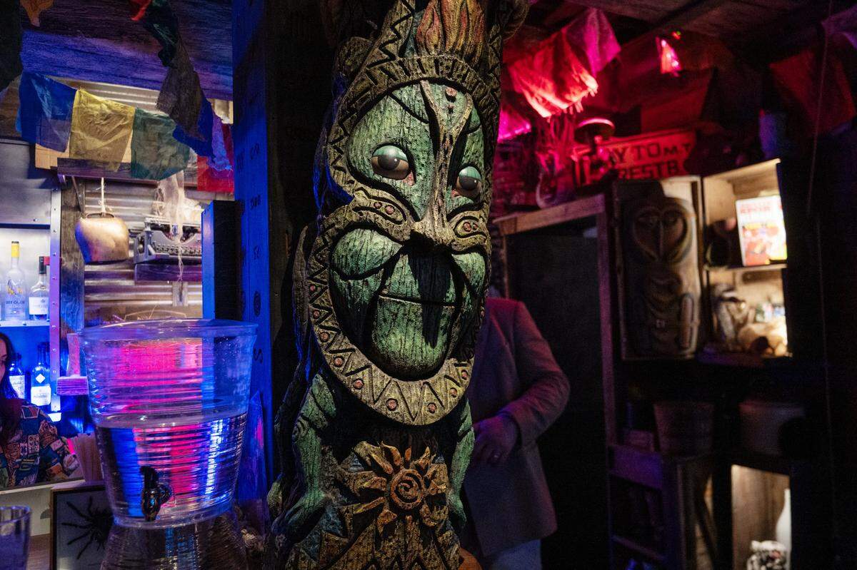 Talking tikis entertain patrons with jokes at Hawthorne’s Hideout, an underground speakeasy in Old Sacramento, on Thursday, Nov. 6, 2025.