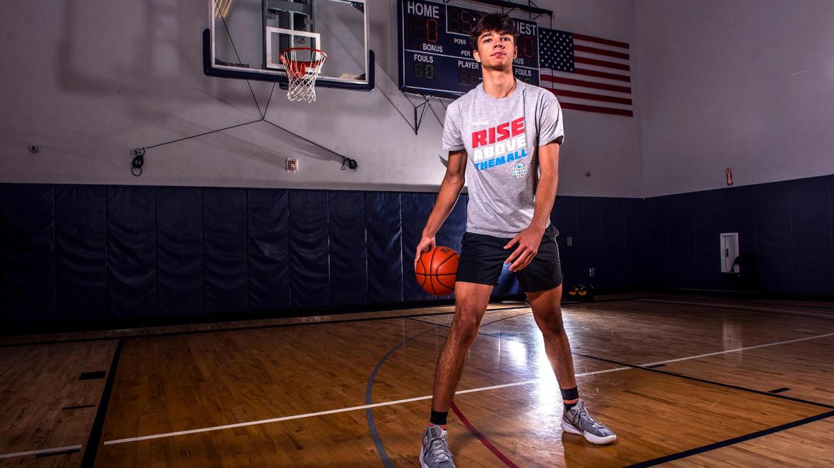 Andrej Stojakovic of Jesuit High School, dribbles the ball during a practice at Sport Courts Fitness in Sacramento on Wednesday, June 29, 2022.