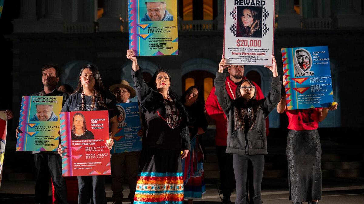 Family members hold signs of their lost loved ones during a Missing and Murdered Indigenous People (MMIP) vigil held at the Capitol on Wednesday, May 1, 2024. The MMIP crisis deepened recently after a suspected murder‑suicide on the Yurok Reservation, highlighting urgent needs for mental health resources in tribal communities.