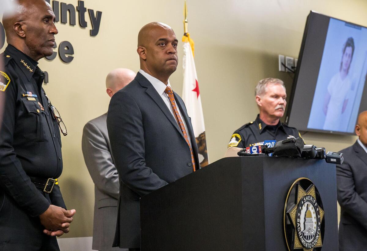Sacramento State Police Chief Chet Madison Jr., center, speaks at a news conference Thursday, Feb. 23, 2023, about the arrest of Nida Muhammad Niazy, the man suspected of sexual assault around the Sacramento State campus. Niazy had identified himself as a Sacramento State student named “Zayn.” Chief Madison was joined by FBI Special Agent in Charge Sean Ragan, Sacramento County Sheriff Jim Cooper, left, and other sheriff’s department personnel at their offices on Orange Grove Avenue.