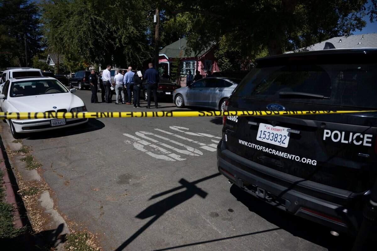 Sacramento police investigate the shooting death of an unidentified man on Sixth Avenue in Oak Park on Tuesday, Sept. 27, 2022. The man drove himself to UC Davis Medical Center, where he died, according to Eaton.