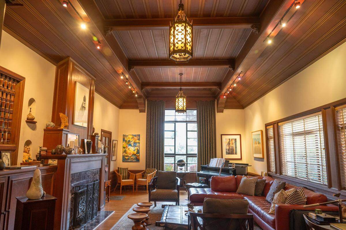 The living room, with its 12-foot high ceilings, of the duplex noted Sacramento architect Leonard F. Starks designed in 1937 as his personal home retains its original character.