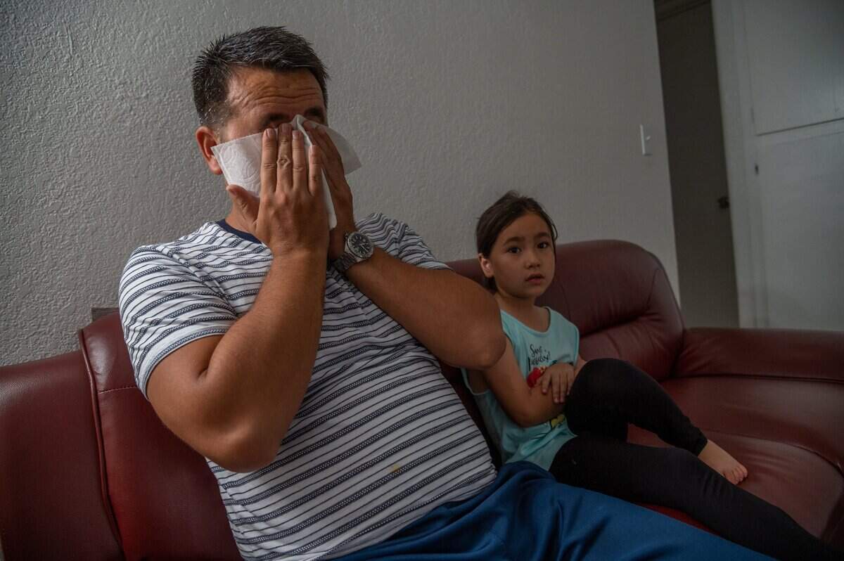 9. Besmellah Khuram, 36, who came to Sacramento from Afghanistan on a Special Immigrant Visa in 2015, wipes his tears on Sunday, Aug. 15, 2021, as he worries about his mother, brother and the state of his country as the Taliban moved into the capital. “I couldn’t sleep last night and I was receiving messages, texts, calls – everybody was panicked, hopeless, stuck in Kabul,” Khuram said.