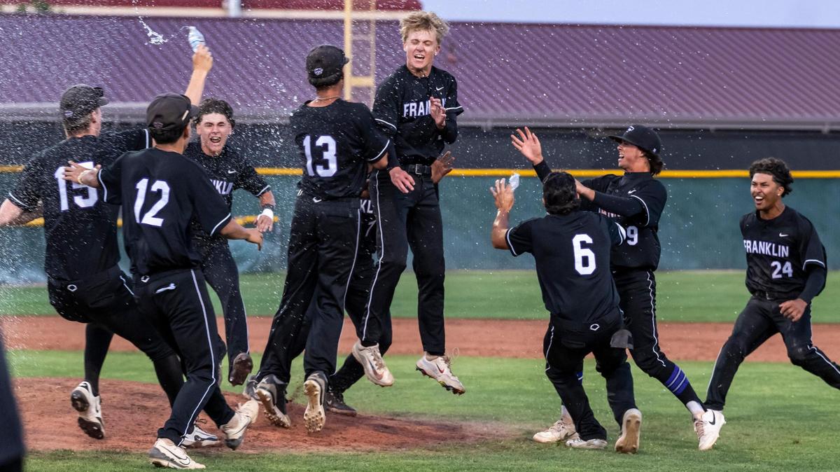 The Franklin High School Wildcats celebrate their 4-3 win over the St. Mary’s Rams of Stockton during the CIF Sac-Joaquin Section Division I baseball championship game Friday at Sacramento City College.