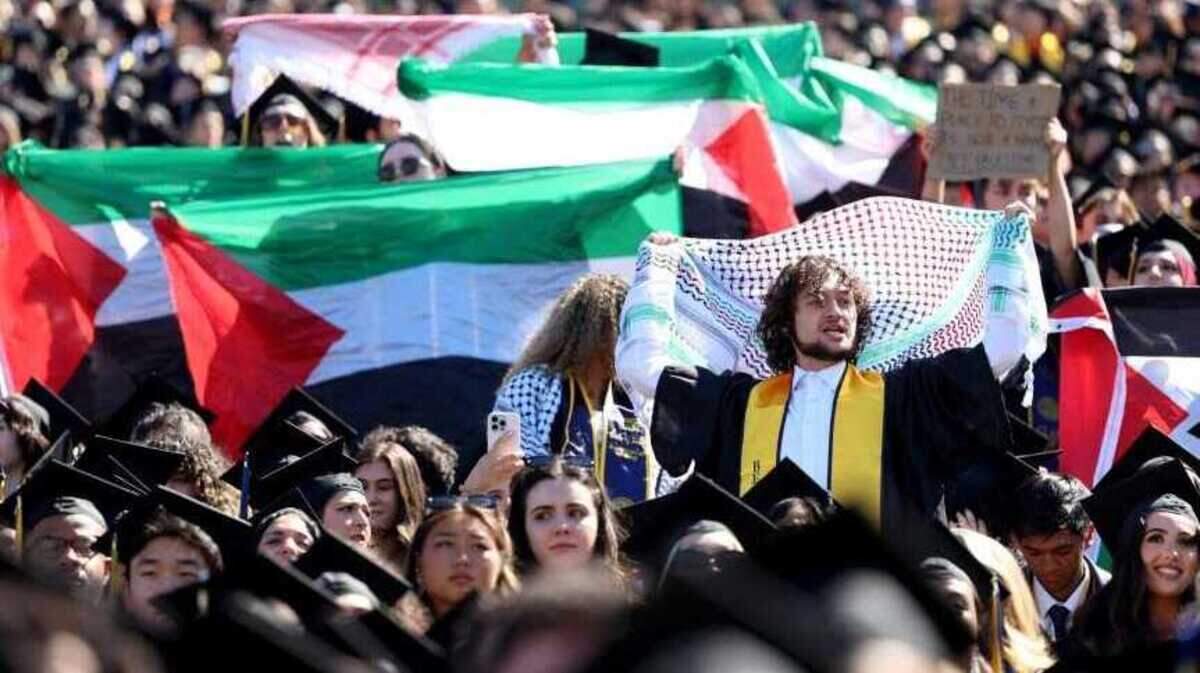 Pro-Palestinian protesters and graduates of the class of 2024 chant and interrupt their UC Berkeley’s graduation ceremony Saturday when Chancellor Carol Christ began to speak at Memorial Stadium in Berkeley.