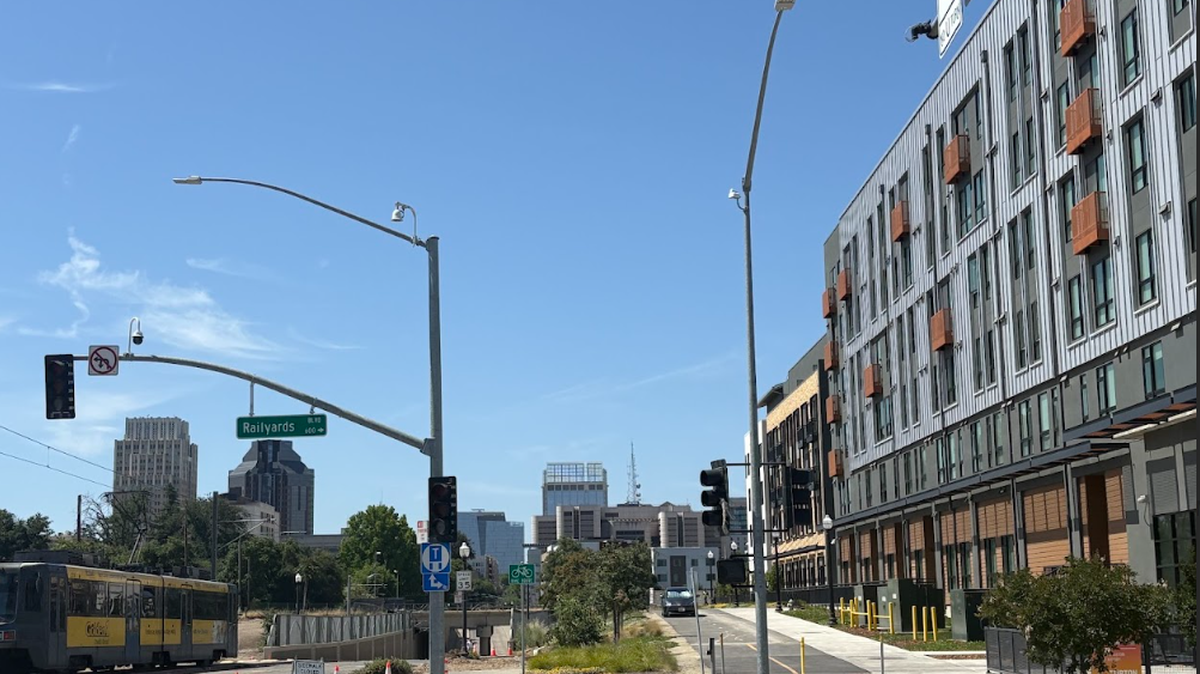Newly opened apartments across the street from SacRT light rail in Sacramento. Senate Bill 79 aims to legalize similar apartments statewide.