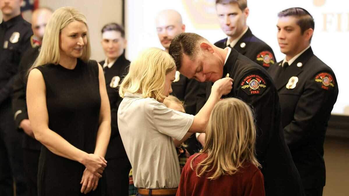 Lucas Shepard receives his division chief badge as El Dorado County Fire Protection District’s fire marshal in February 2025. Shepard, 43, died unexpectedly during a family vacation, the fire department announced.