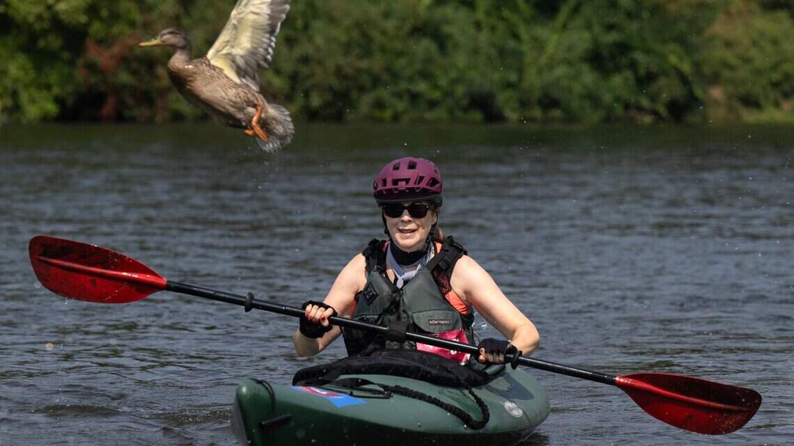 See triathletes race along the American River as historic event returns to Sacramento area