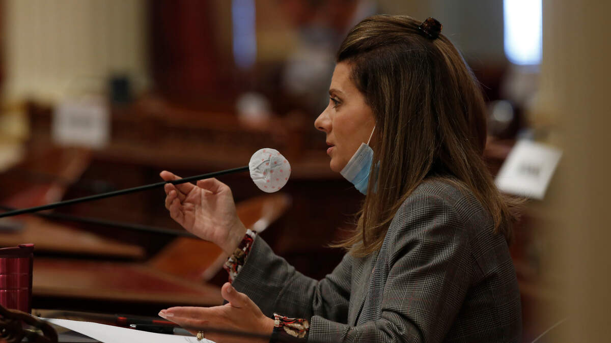 State Sen. Melissa Melendez, R-Lake Elsinore, a member of the Senate Budget and Fiscal Review Committee poses a question as lawmakers grapple with state budget deficit, in Sacramento, Calif., Friday, June 12, 2020. (AP Photo/Rich Pedroncelli)