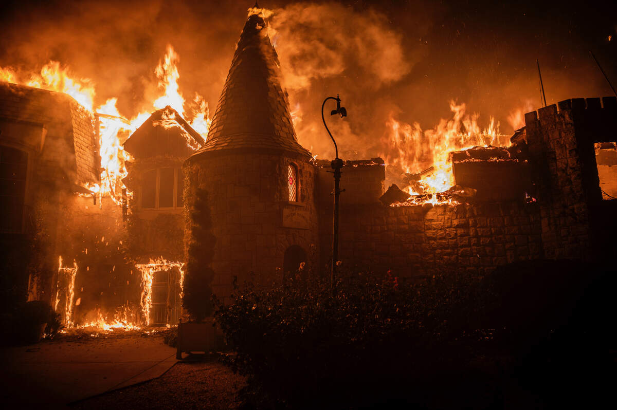 14. The Chateau Boswell winery goes up in flames as the Glass Fire burns along the Silverado Trail near St. Helena in the Napa Valley on Sunday night, Sept. 27, 2020.
