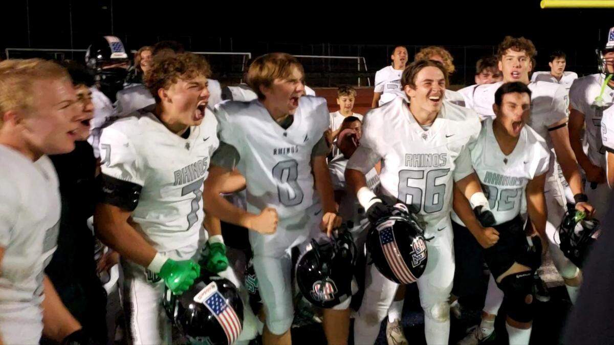Twelve Bridges players celebrate in a postgame gathering after a 51-7 win over Casa Roble on Friday in Orangevale.