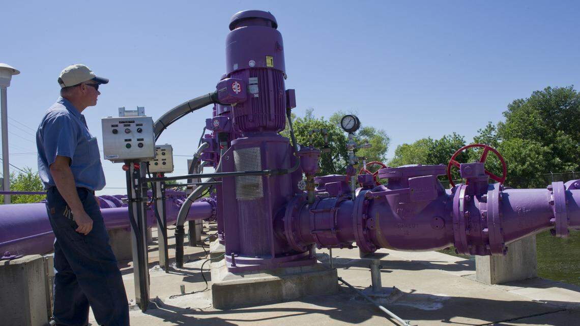 Bill Yackley, an operator at the El Dorado Hills wastewater treatment plant, stands near purple pipes used in a multi-part recycling process April 10, 2014.
