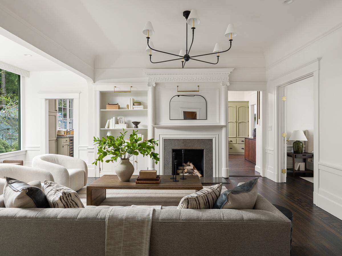 The residence is anchored by a main house dating to 1907, paired with the cottage and a one-bedroom apartment above the detached garage.