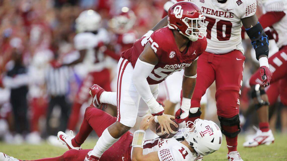 NORMAN, OKLAHOMA - AUGUST 30: Defensive lineman Gracen Halton #56 of the Oklahoma Sooners sacks quarterback Forrest Brock #11 of the Temple Owls for a loss of seven yards in the first quarter at Gaylord Family Oklahoma Memorial Stadium on August 30, 2024 in Norman, Oklahoma. Oklahoma won 51-3. (Photo by Brian Bahr/Getty Images)