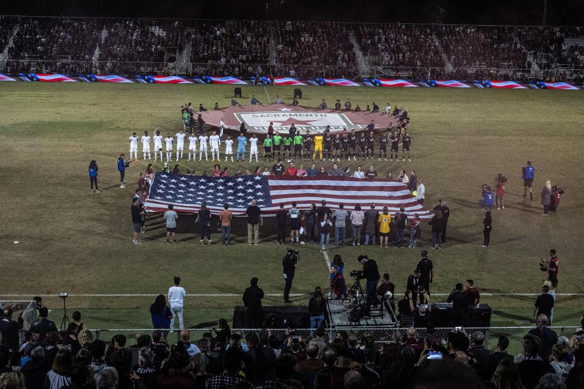 Sacramento Republic FC and Phoenix Rising stand for the National Anthem during the 2023 USL Western Conference finals at Heart Health Park in Sacramento.
