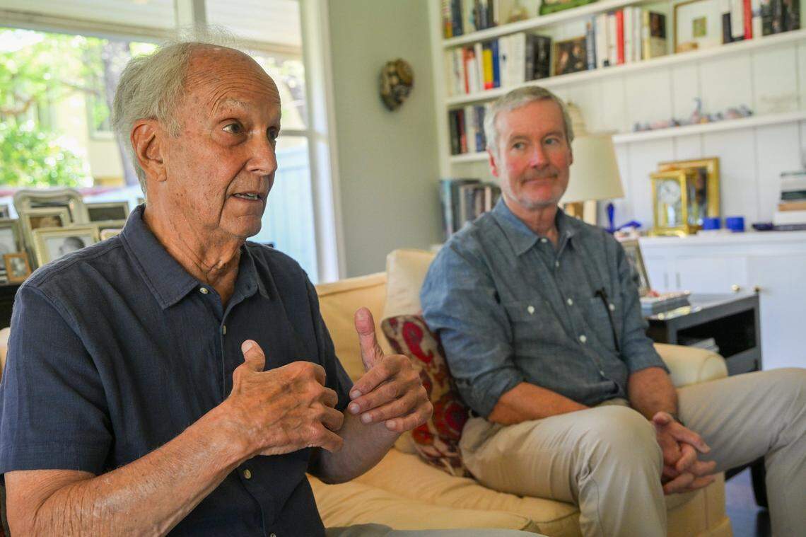 Daniel Brunner, left, president of the Capital Public Radio Endowment Board, and board member Buzz Wiesenfeld talk on Wednesday about the proposal the board sent to Sacramento State President Luke Wood urging the radio station merge with nonprofit PBS TV station KVIE.