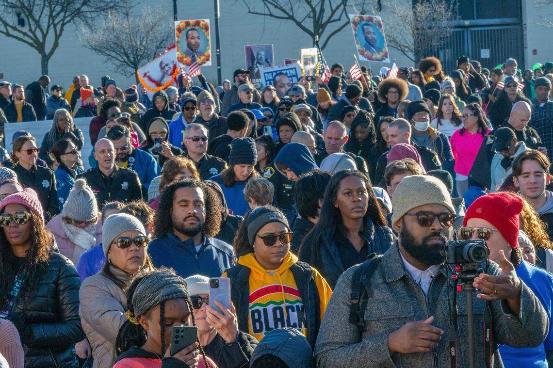 Participants listen to speakers before the March for the Dream honoring Martin Luther King Jr. on Monday at Sacramento City College.