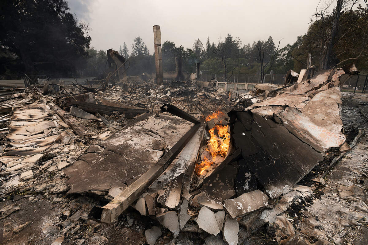 Foothills Adventist Elementary School in Deer Park smolders after burning in the Glass Fire in Napa County on Monday, Sept. 28, 2020.