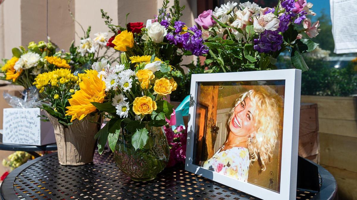 A memorial is set up outside the House of Oliver restaurant for Vita Joga, who worked as a waitress at the restaurant, on Tuesday, June 22, 2021, in Roseville. She was shot to death while at work on Monday, June 21, 2021, at the restaurant.