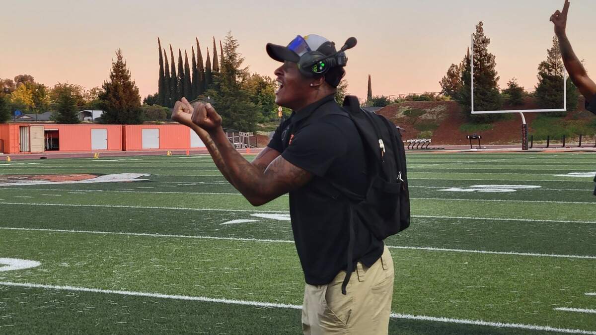 Foothill coach Jemel Johnson shouts instructions to his team during a game against El Camino on Friday, Sept. 2, 2022.