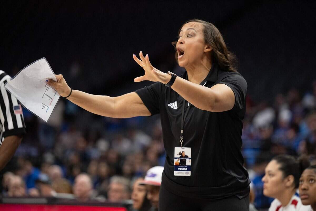 Christian Brothers coach Shandyn Foster calls a play against the Atwater Falcons in the 2025 CIF Sac-Joaquin Section Division ll girls basketball championship game at Golden 1 Center.