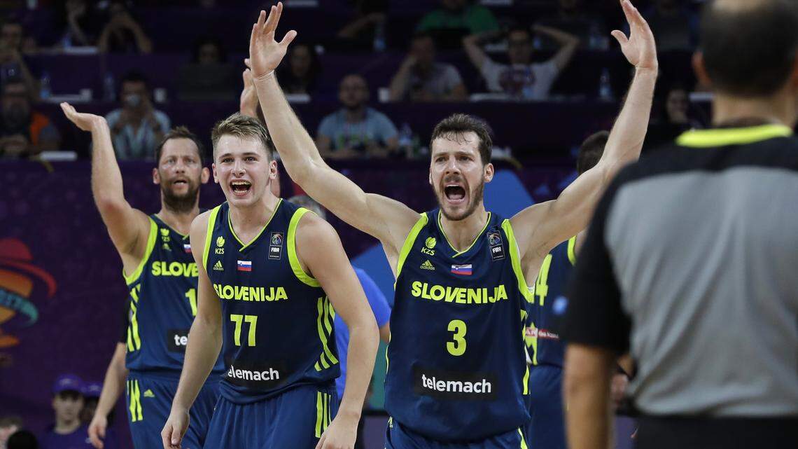 Slovenia's Luka Doncic, left, and Goran Dragic react during their Eurobasket semifinal match against Spain in Istanbul on Sept. 14, 2017.