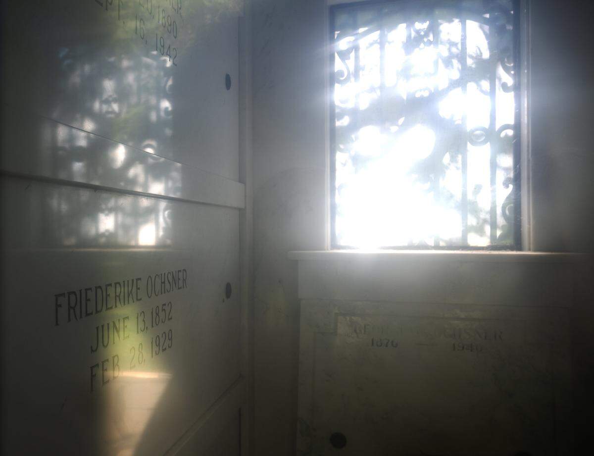 Light streams through the window of a mausoleum for the Ochsner family at Odd Fellows Cemetery in Sacramento on Tuesday. A crypt in many cemeteries can cost more than $20,000, but will run about $8,000 at the Odd Fellows Cemetery.