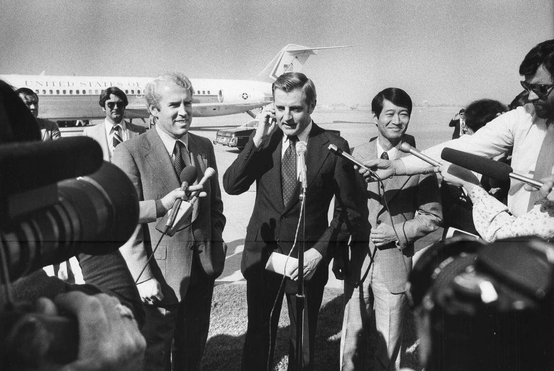 Vice President Walter Mondale, center, stands in front of Air Force Two while in Sacramento to campaign for Democratic congressional candidates Assemblyman Vic Fazio, left, and City Councilman Robert Matsui, right, in October 1978. Both candidates would win seats in the House of Representatives in the following month.