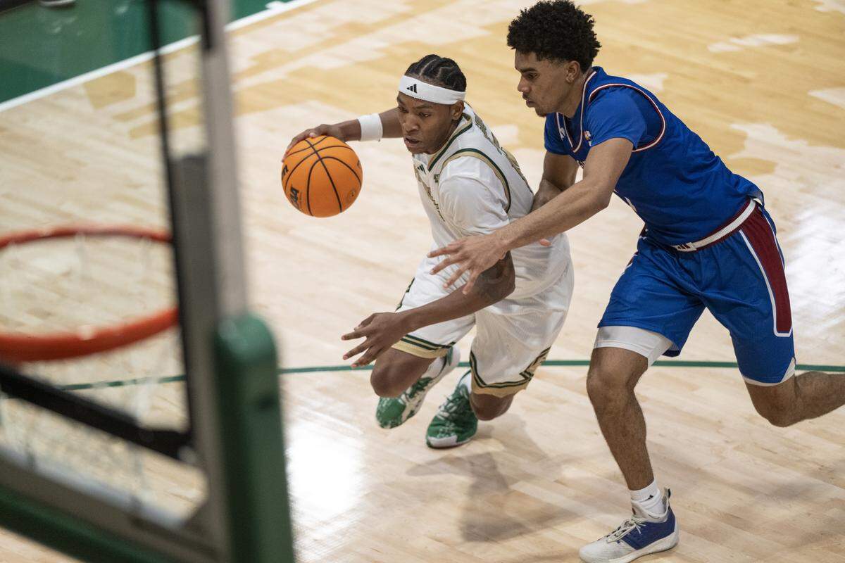Sacramento State guard Prophet Johnson (16) dribbles the ball during a game between Sac State and Presbyterian at Hornet Pavilion in Sacramento on Sunday, Nov. 16, 2025.