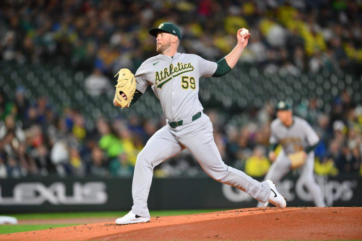 Mar 28, 2025; Seattle, Washington, USA; Athletics starting pitcher Jeffrey Springs (59) pitches to the Seattle Mariners during the first inning at T-Mobile Park. Mandatory Credit: Steven Bisig-Imagn Images