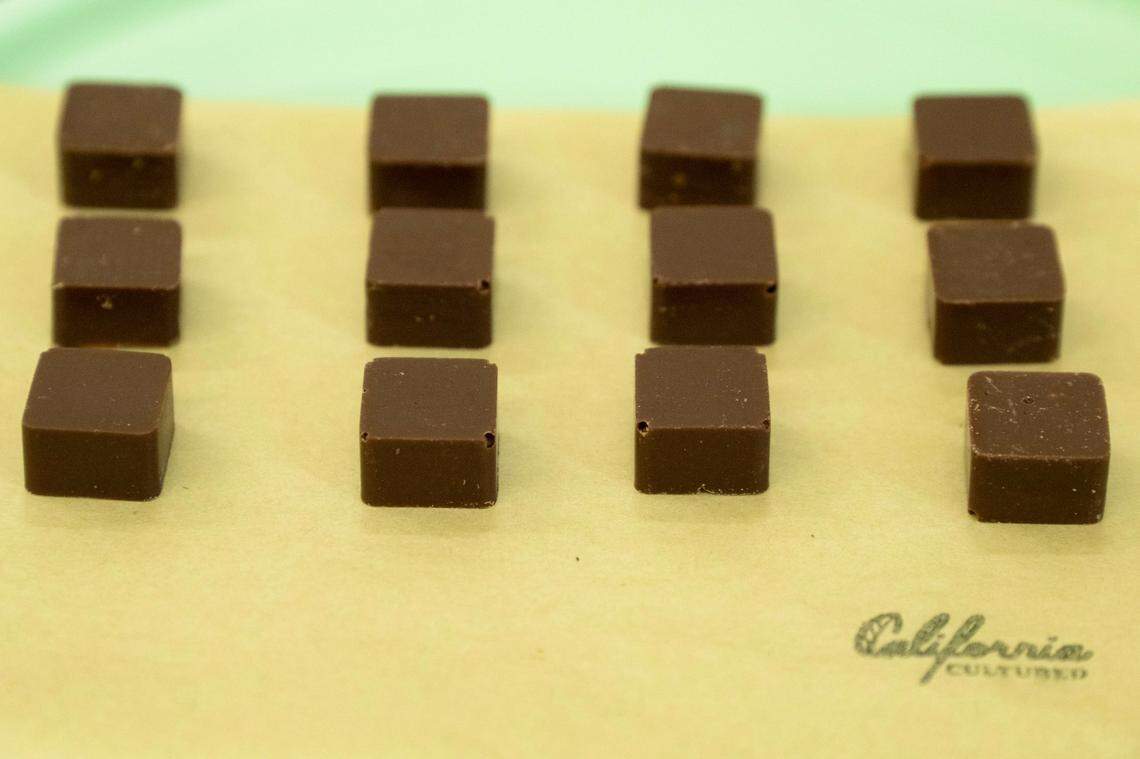 Cultivated dark chocolate squares are made at California Cultured in West Sacramento last month. Cultivated chocolate can be an ethical alternative to traditional chocolate.