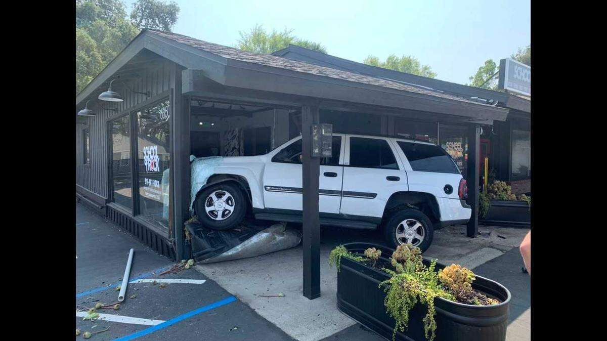 A white SUV crashed into the School of Rock music school on Wednesday, August 11, 2021. Sacramento Metropolitan Fire District said no one in the vehicle was injured.
