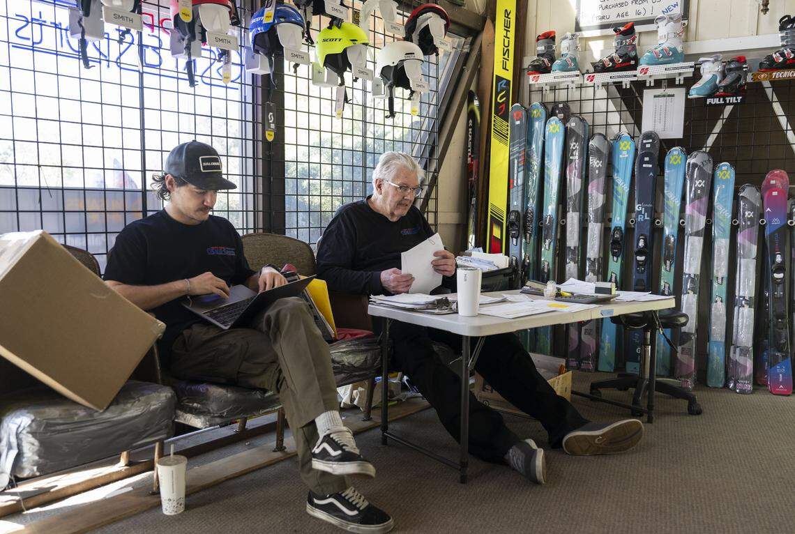 Carson Schmidt, of Sacramento, and Bill Proffit, owner of Land Park Ski & Sports in Sacramento, work together at the shop on Thursday, Feb. 26, 2026. Schmidt, who recently rescued a skier at Palisades Tahoe last week, will become the new owner of the store starting March 2. 