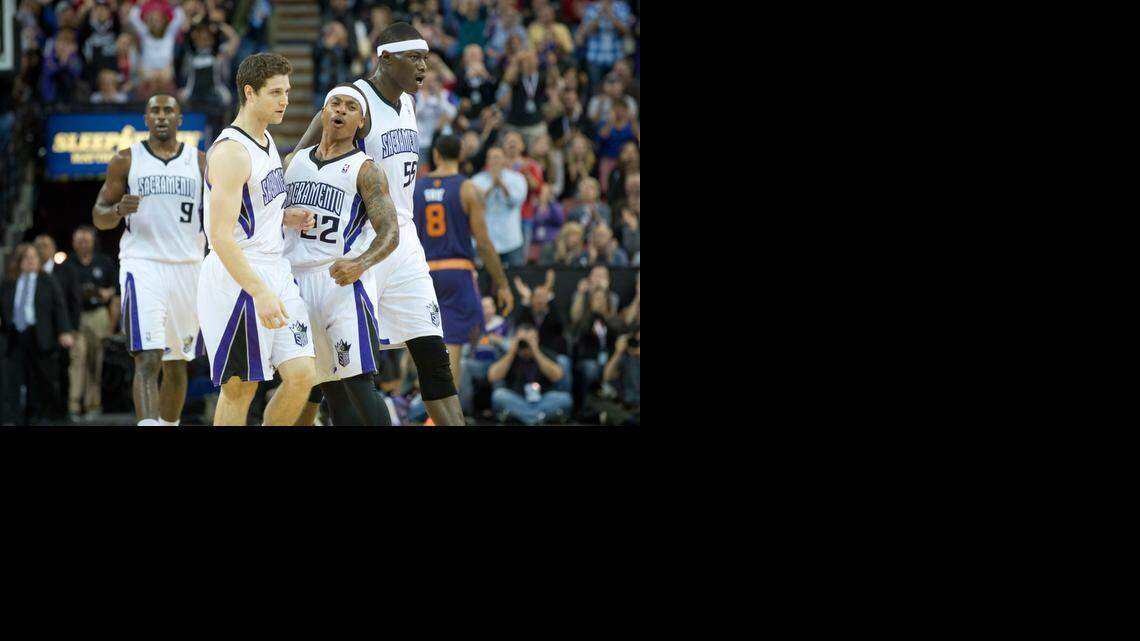 Sacramento Kings point guard Isaiah Thomas (22) celebrates a three point basket by teammate Jimmer Fredette (7) against the Phoenix Suns during their 107-104 victory at Sleep Train Arena on Tuesday, Nov. 19, 2013 in Sacramento, Calif.
