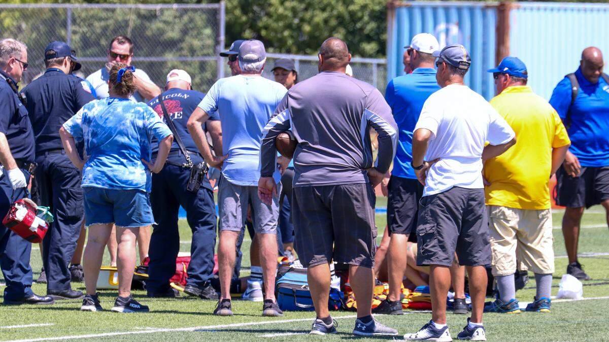 Capital Christian High School lineman Trevor Loveall was hospitalized after collapsing on the field during a four-team scrimmage at Lincoln High School on Saturday, Aug. 12, 2023.