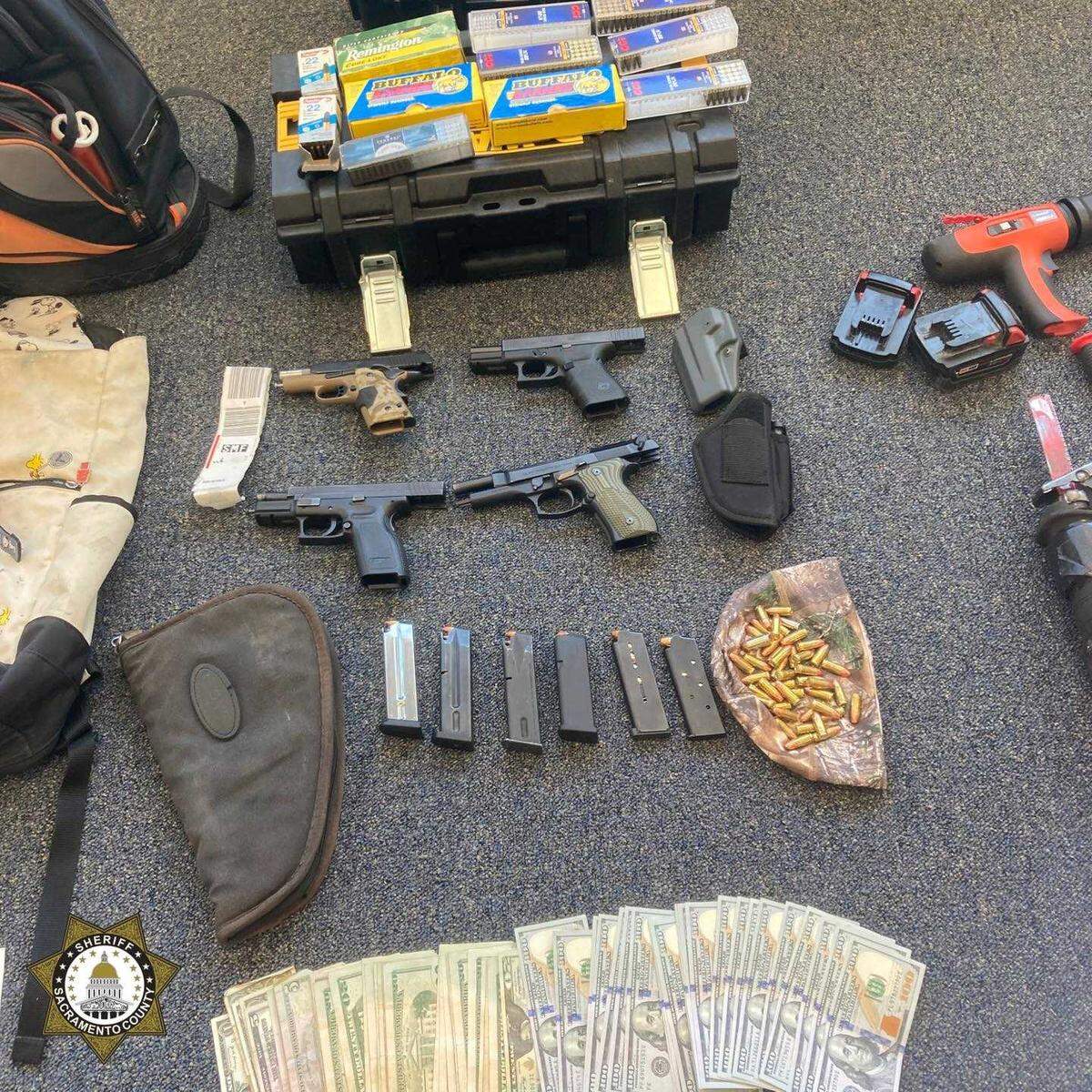 Investigators on Wednesday April 26, 2023, confiscated stolen guns, cash and suspected burglary tools at the home of a man suspected of stealing catalytic converters from vehicles at the Sacramento International Airport.